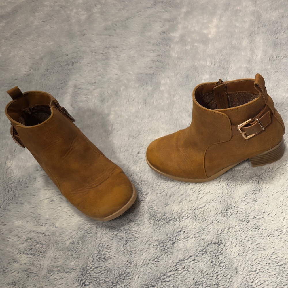 Girls love a little heel! Cute brown booties!